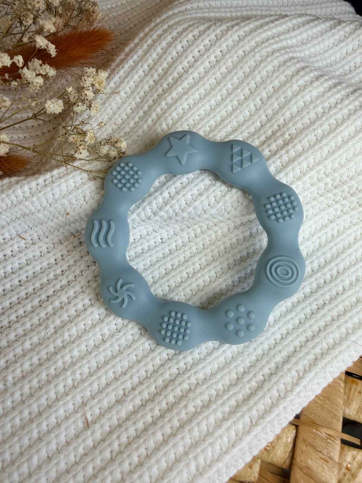 Jouet de dentition rond bleu en silicone