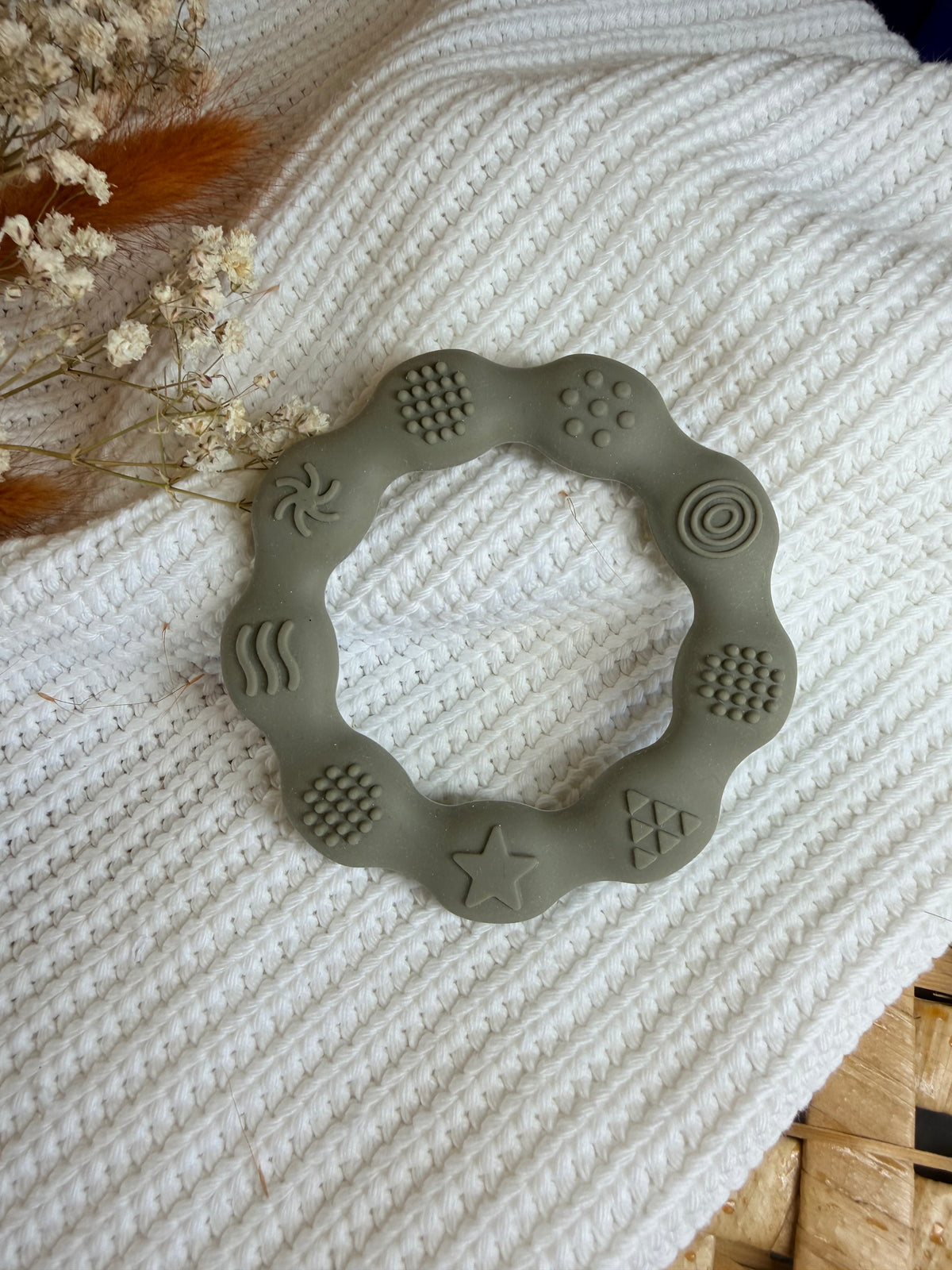 Jouet de dentition rond gris en silicone