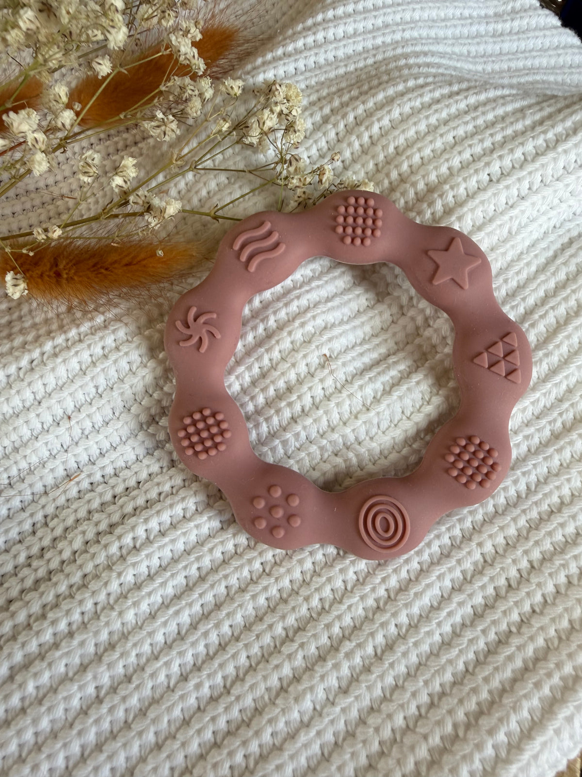 Jouet de dentition rond rose sucré en silicone