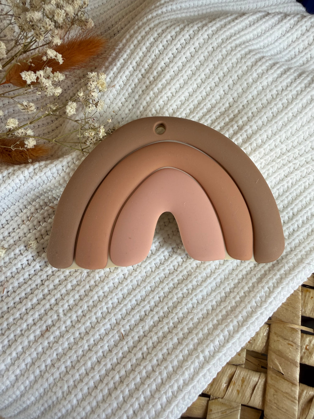 Jouet de dentition arc-en-ciel rose et beige en silicone